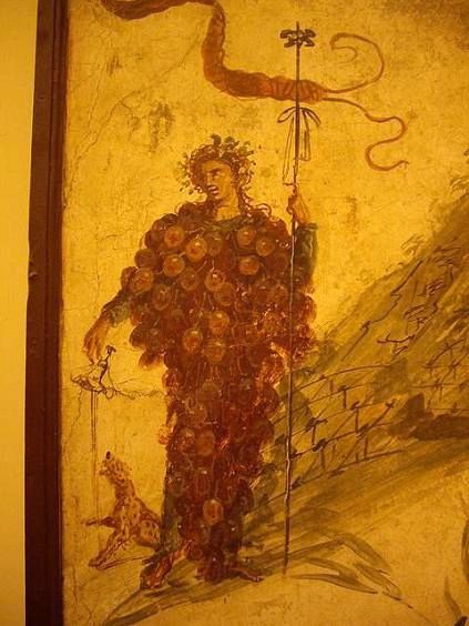 бог Дионис в виде грозди винограда